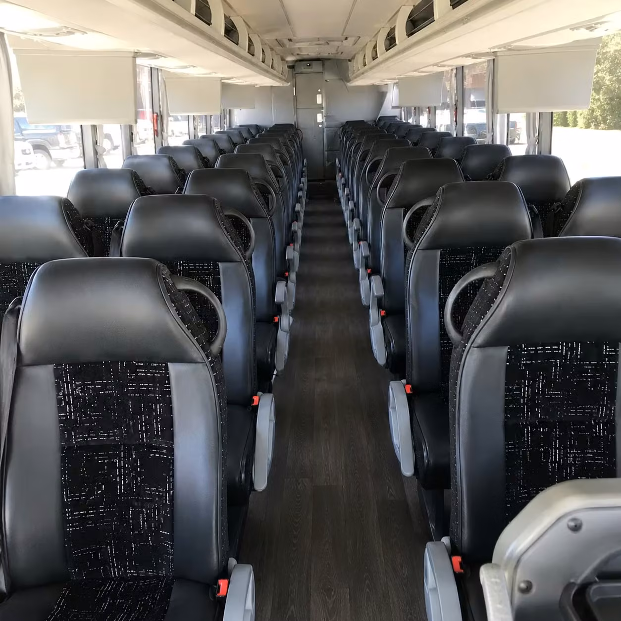 how trip distance and duration affect charter bus rates in raleigh